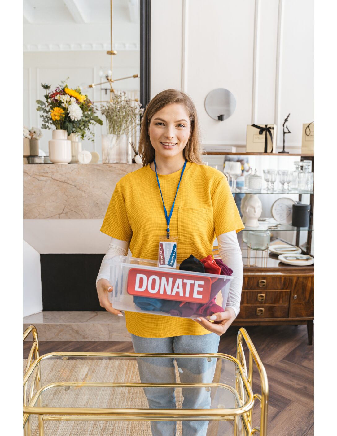 woman holding a donation box 